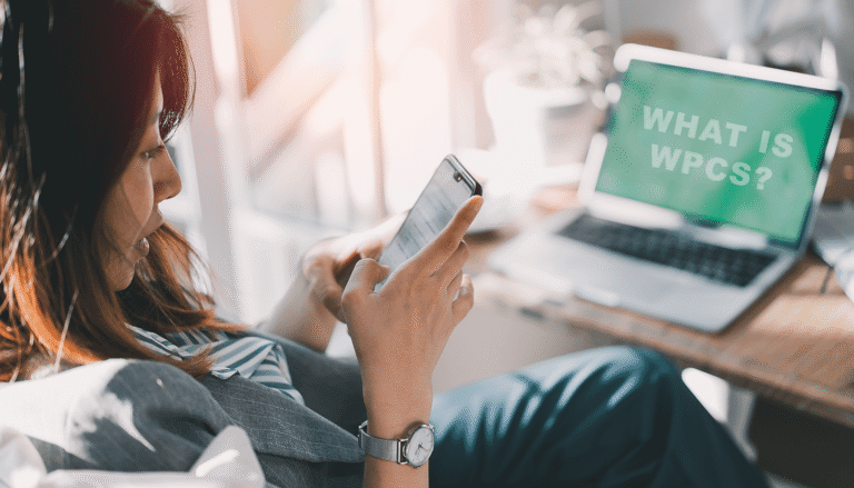 Woman reviewing a smartphone attentively to find caregiving information and support resources
