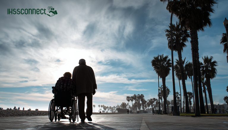 elderly couple on ocean front walk under palm trees